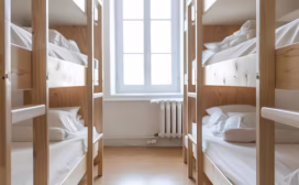 dormitory-room-with-bunk-beds-hostel-accommodation-concept-hostel-dorms-bunk-beds-shared-accommodation-budget-lodging-shared-living-spaces_864588-244154